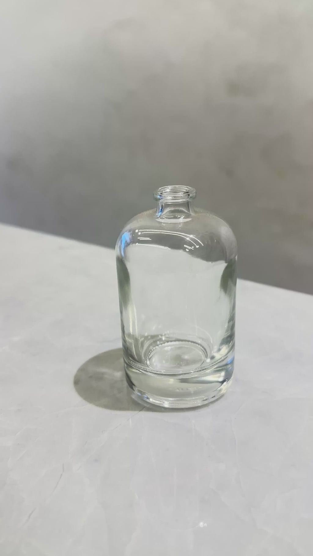 50 ML ROUND BOTTLE