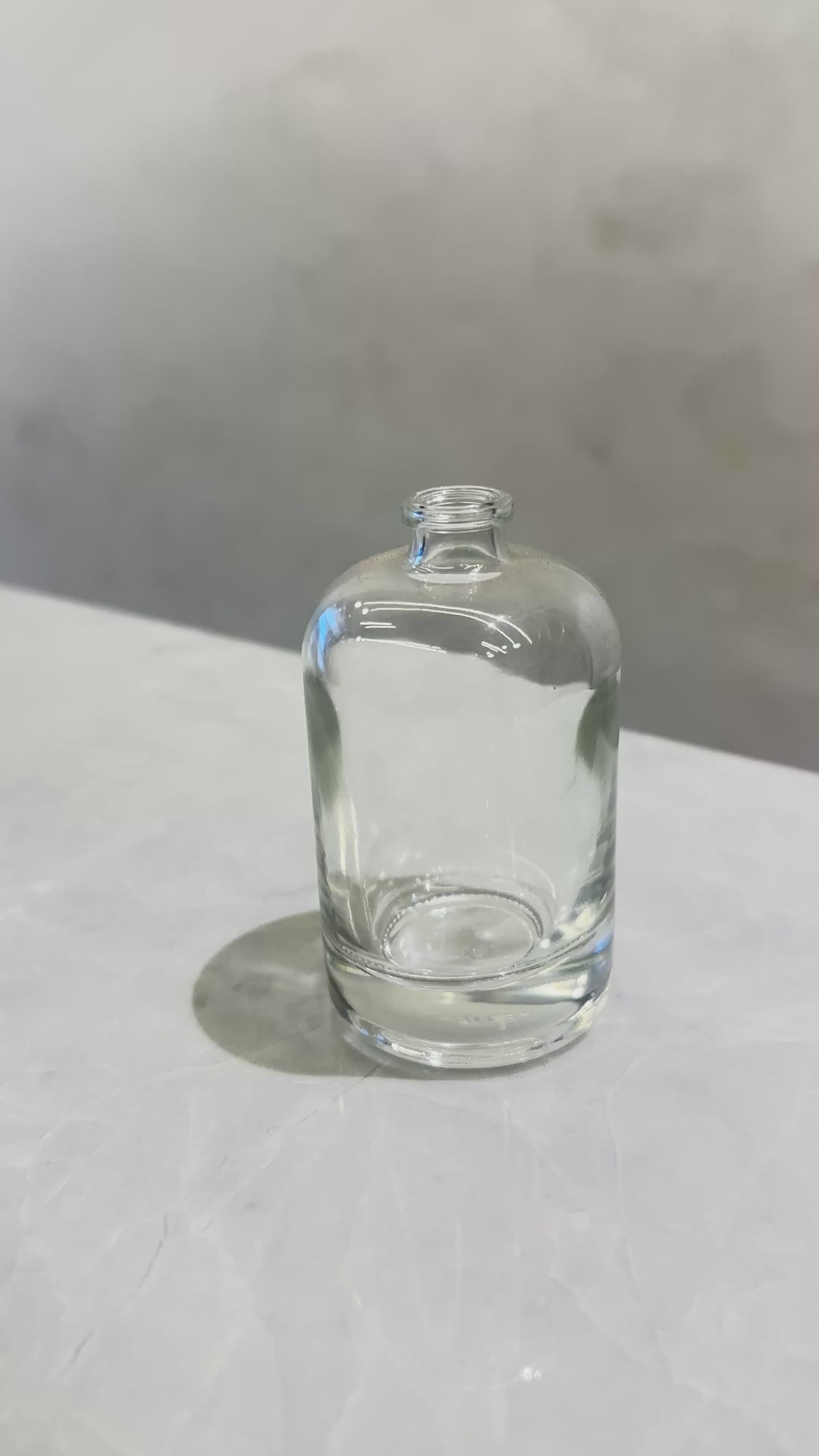 50 ML ROUND BOTTLE